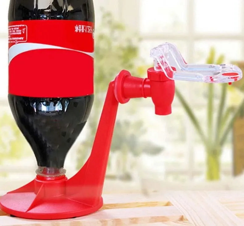 Red Magic Tap soda dispenser attached to inverted 2-litre bottle