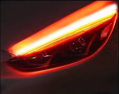 Flexible silicone car LED daytime running light strip with flowing turn signal in multiple length options