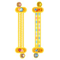 A yellow plastic children's cartoon digital decomposition ruler showing measurements up to 24.5 cm.