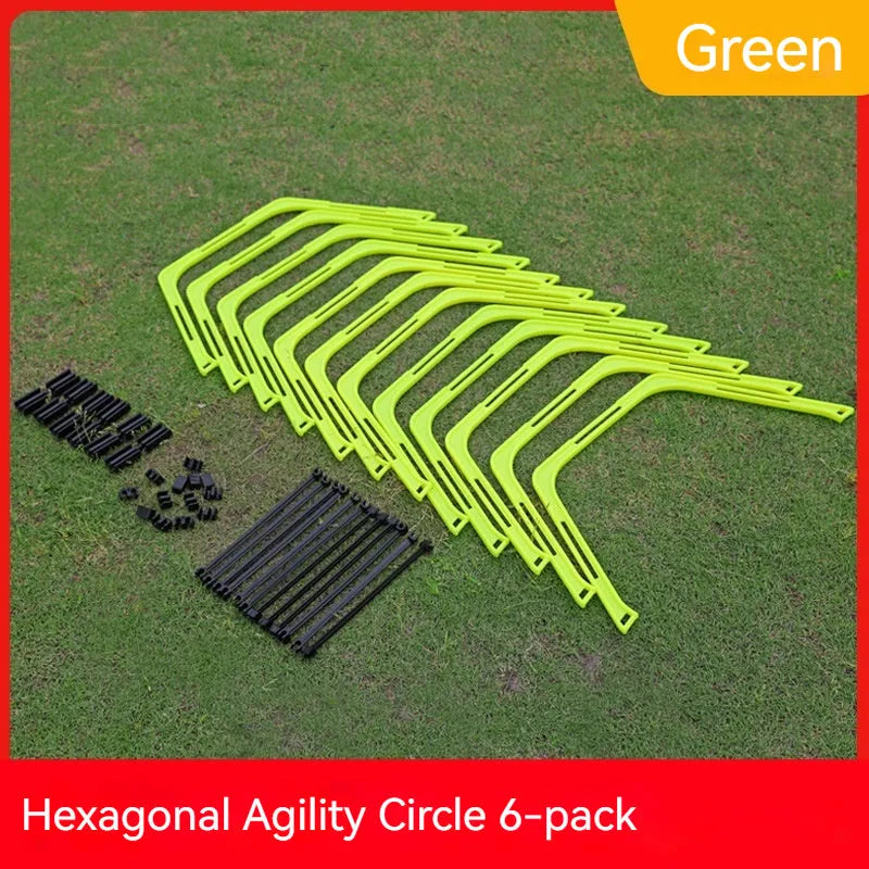 Six foldable hexagon football agility training rings in yellow, green, and orange colours laid out on grass.