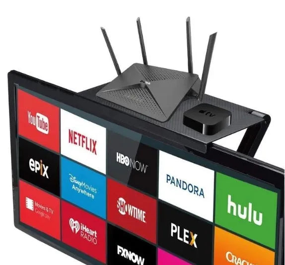 Black adjustable 13-inch screen top shelf mounted above a monitor, holding a streaming device and remote.