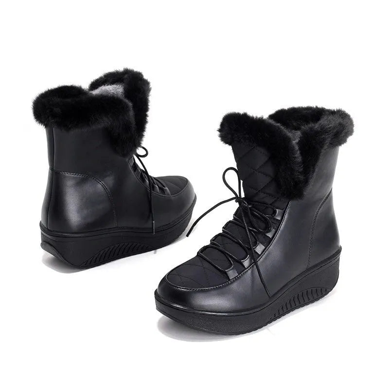 Women's black platform winter boots with lace-up closure and plush lining