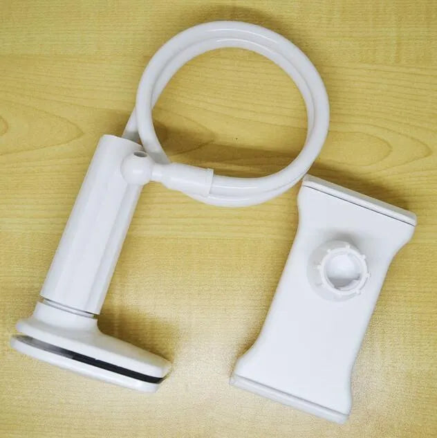 Black aluminium alloy bedside phone stand with a long flexible arm holding a mobile phone on a table.