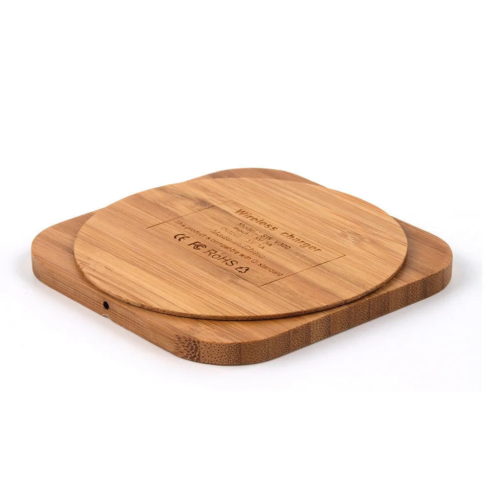 Square wooden bamboo 5W QI wireless charging pad on a desk