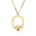 Gold or silver geometric stainless steel necklace on an adjustable cross chain.