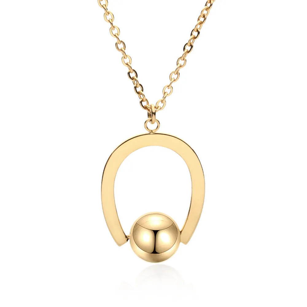 Gold or silver geometric stainless steel necklace on an adjustable cross chain.