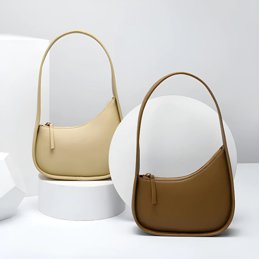 Women's genuine leather half-moon shoulder handbag with wide strap in caramel colour