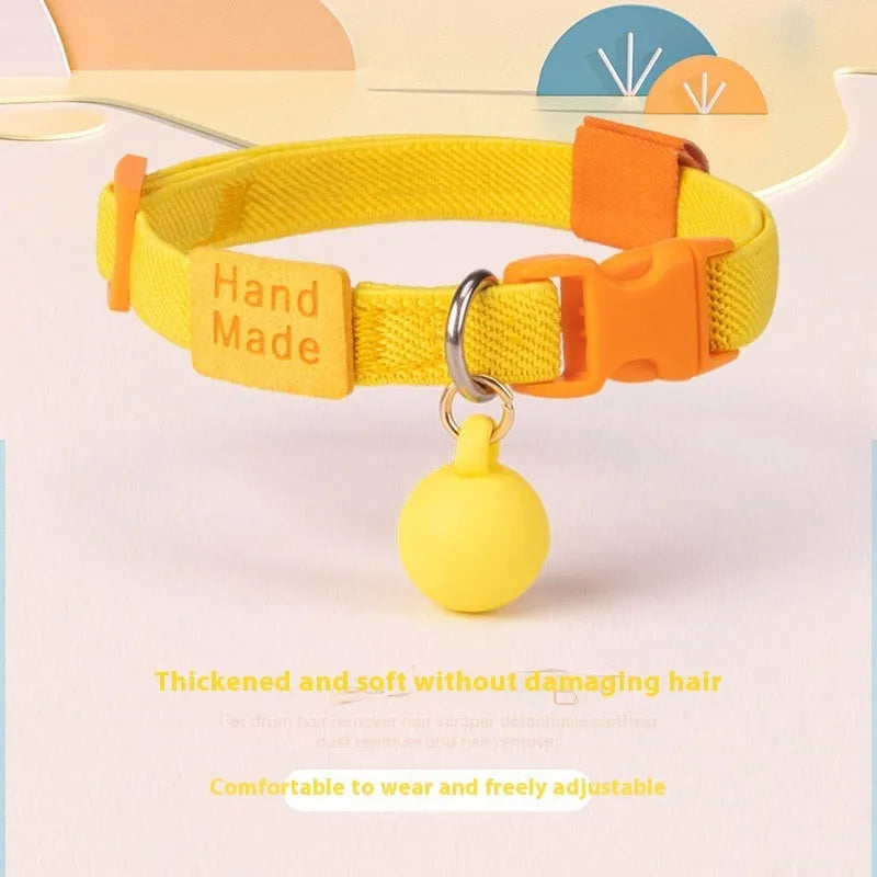 Small dog elastic pet collar in polyester material showing adjustable length of 22-32cm in seven colour options