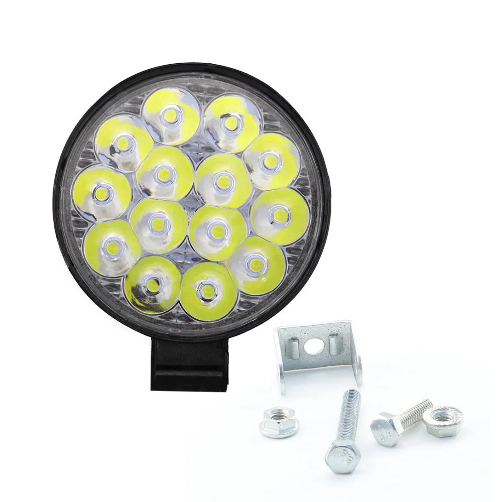 White aluminium mini round 42W LED work light with IP67 waterproof rating for vehicles and machinery.