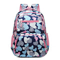 Blue children's schoolbag with air pillow shoulder straps and Oxford cloth exterior.