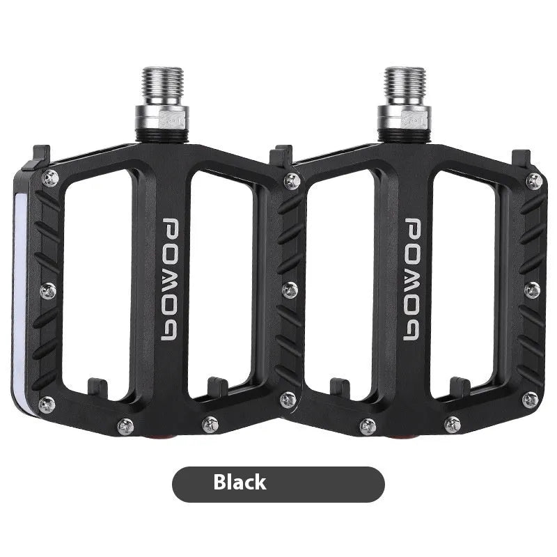 Aluminium alloy bicycle pedals with integrated LED illumination in black purple red gold titanium colour options