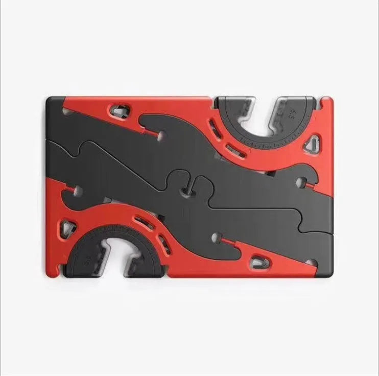 Black plastic card type mobile phone holder with lazy bracket on a desktop.