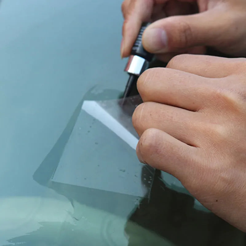 Yellow car glass repair tool set with windscreen repair liquid and injection tools
