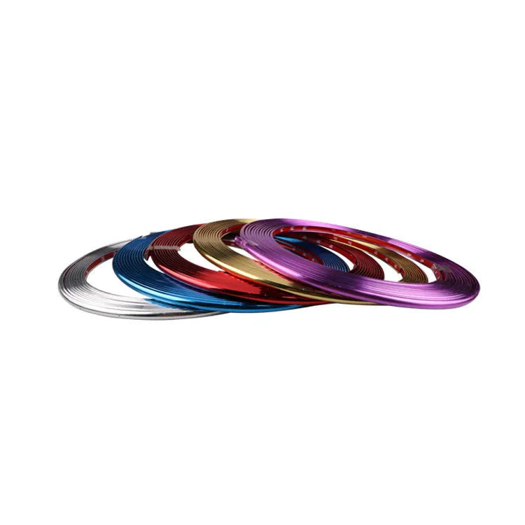 8 metre roll of electroplated purple PVC wheel hub trim strip on a white background.