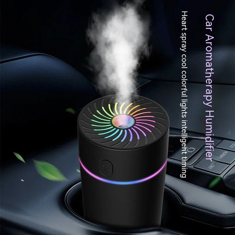 Compact black car USB humidifier with aromatherapy function on a dashboard