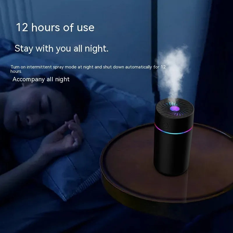 Compact black car USB humidifier with aromatherapy function on a dashboard
