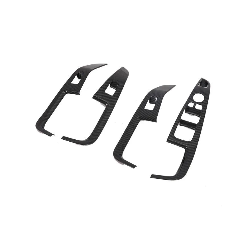 Black ABS replacement trim panel for 2019 BMW X5 front cup holder and air vent.