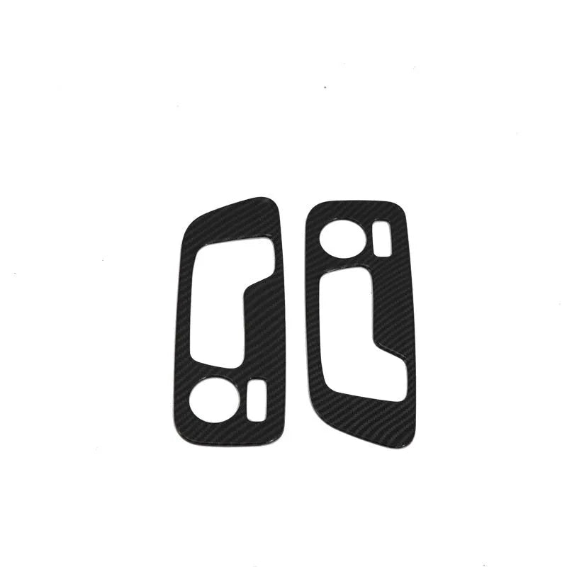 Black ABS replacement trim panel for 2019 BMW X5 front cup holder and air vent.