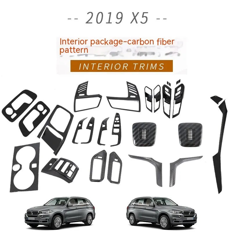 Black ABS replacement trim panel for 2019 BMW X5 front cup holder and air vent.