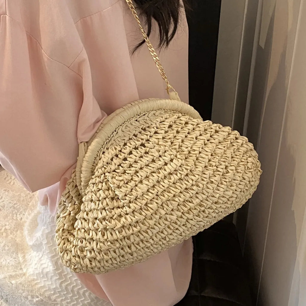 Khaki paper straw shoulder bag for women with shell shape, chain detail, and polyester lining for beach and daily use