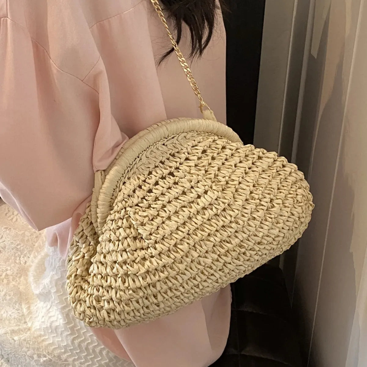 Khaki paper straw shoulder bag for women with shell shape, chain detail, and polyester lining for beach and daily use