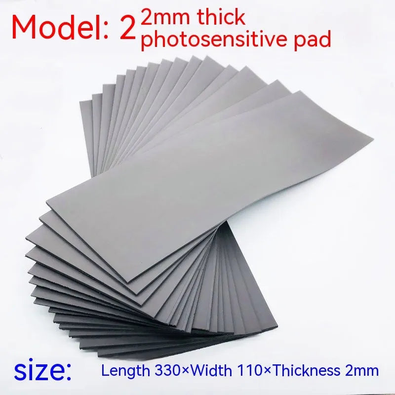 Black and grey plastic photosensitive pad for seal making, 330mm by 110mm.