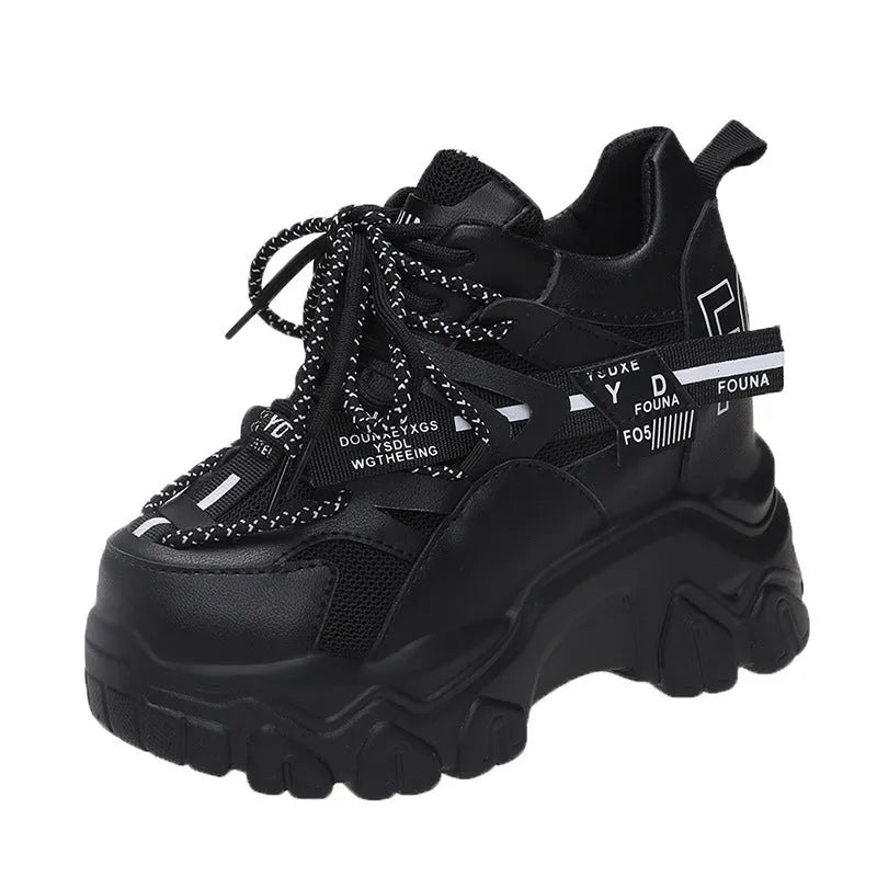 White women's mesh platform sports shoes with cross-strap detail and rubber sole.