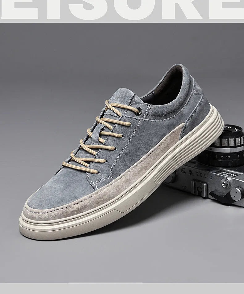 Men's grey casual leather skate shoes with rubber sole and round toe design