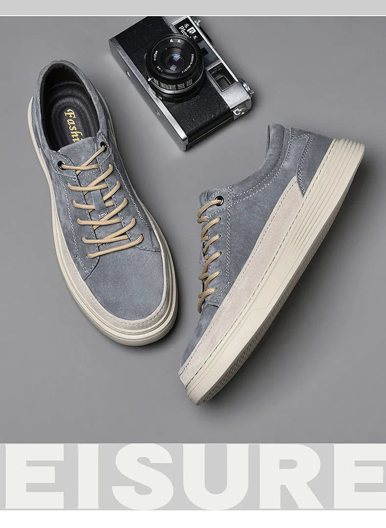 Men's grey casual leather skate shoes with rubber sole and round toe design