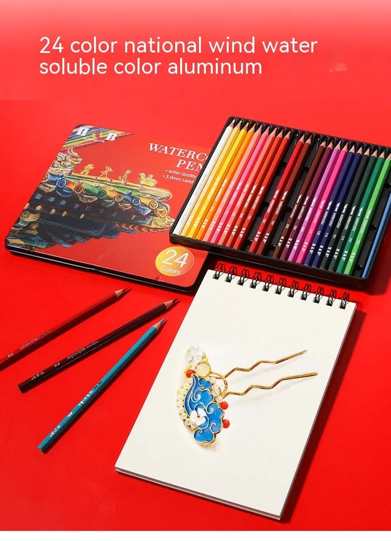 Metal tin open to show 24 water-soluble coloured pencils and a brush for painting techniques.