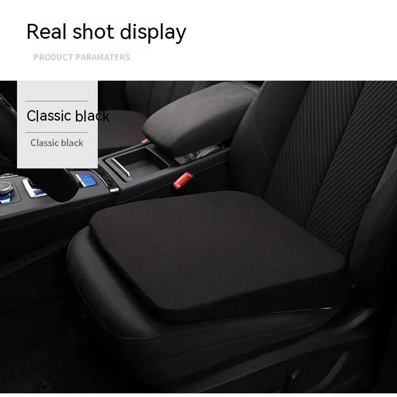 Black car seat cushion adding 6cm of height on a vehicle seat.