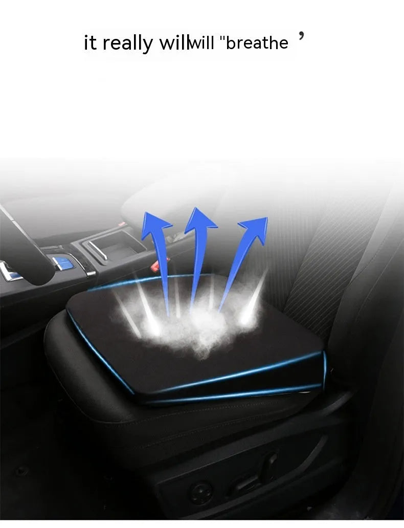 Black car seat cushion adding 6cm of height on a vehicle seat.