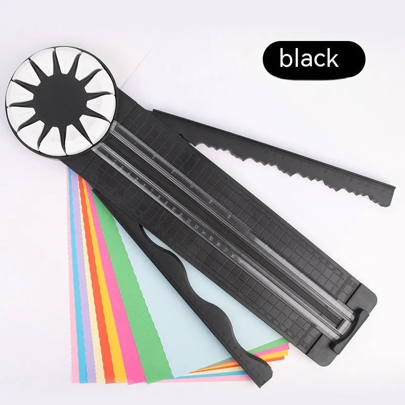 Pink and black plastic paper cutting machine with dotted grid pattern and multiple cutting functions