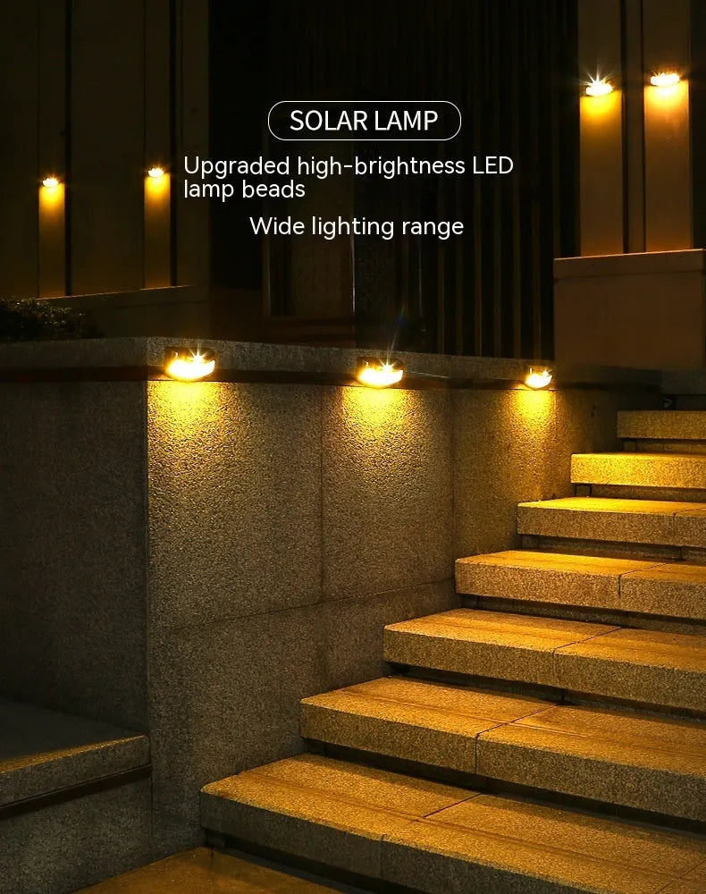 Solar outdoor wall lamp with smiling face design for garden and courtyard lighting