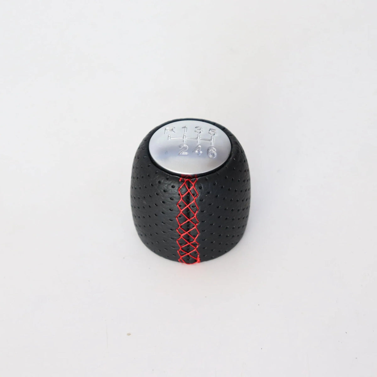 Black perforated PU leather gear knob for Alpha car with sewn seam, shown next to red and white line options.