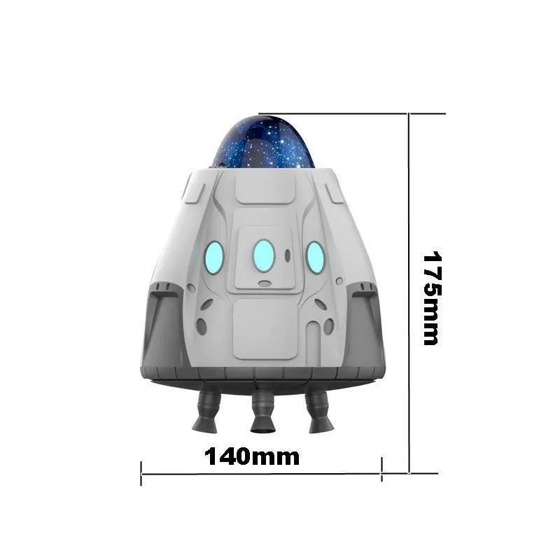 White capsule-shaped Northern Lights ambience light with laser projection on a dark wall