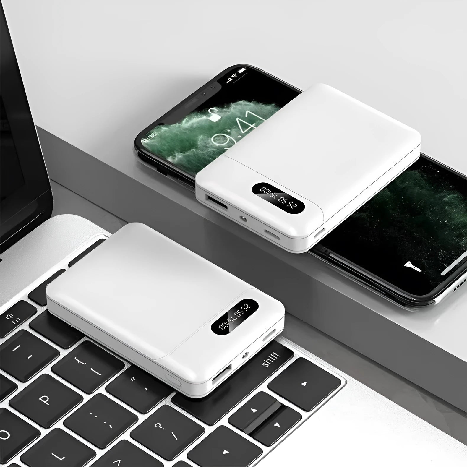 White and black portable power bank showing multi-USB ports and compact 92mm x 63mm x 23mm dimensions