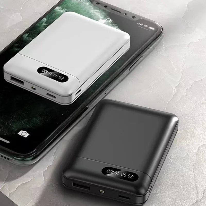 White and black portable power bank showing multi-USB ports and compact 92mm x 63mm x 23mm dimensions