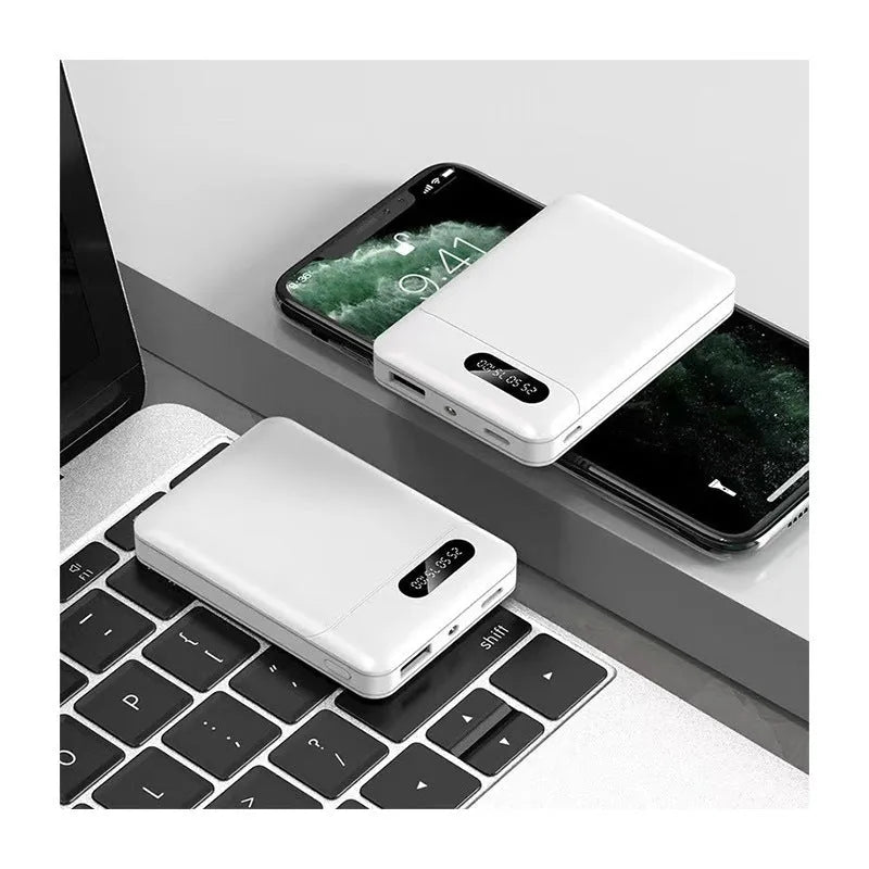 White and black portable power bank showing multi-USB ports and compact 92mm x 63mm x 23mm dimensions