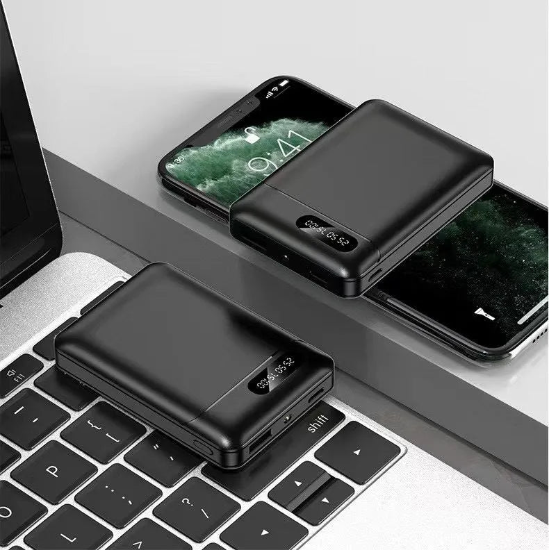 White and black portable power bank showing multi-USB ports and compact 92mm x 63mm x 23mm dimensions