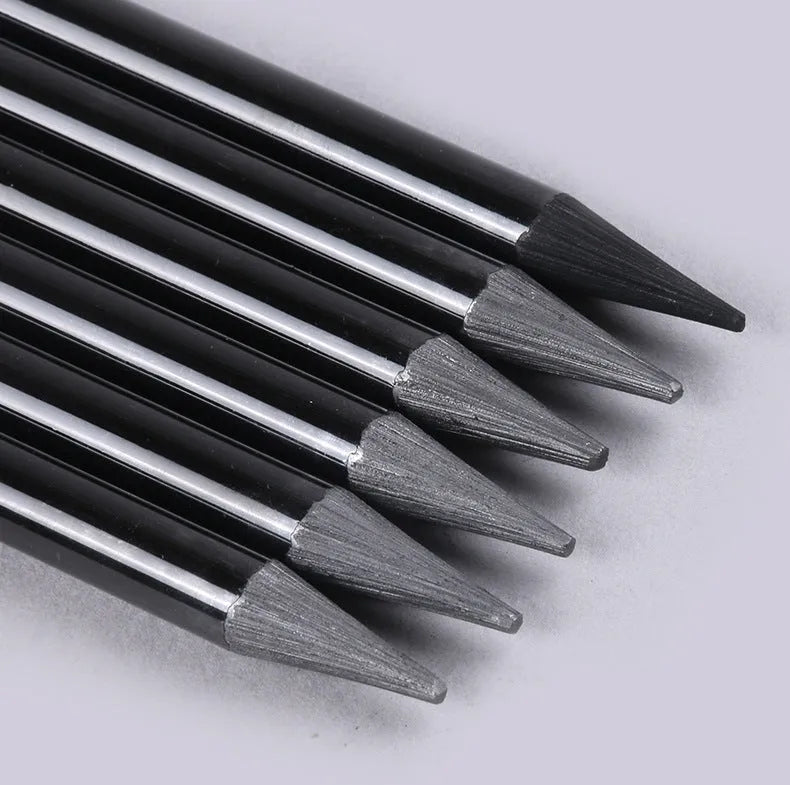 Carbonized pencil set showing 6 graphite and 3 carbonized pencils on suction card packaging
