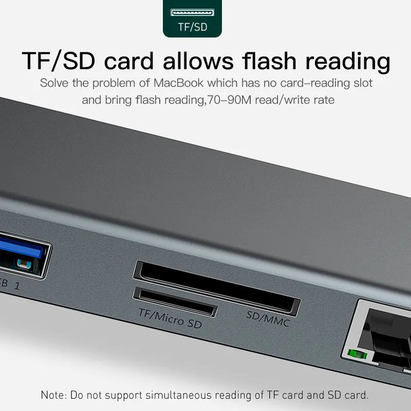 Grey aluminium ten-port laptop docking station with cooling bracket showing HDMI, VGA, and USB ports