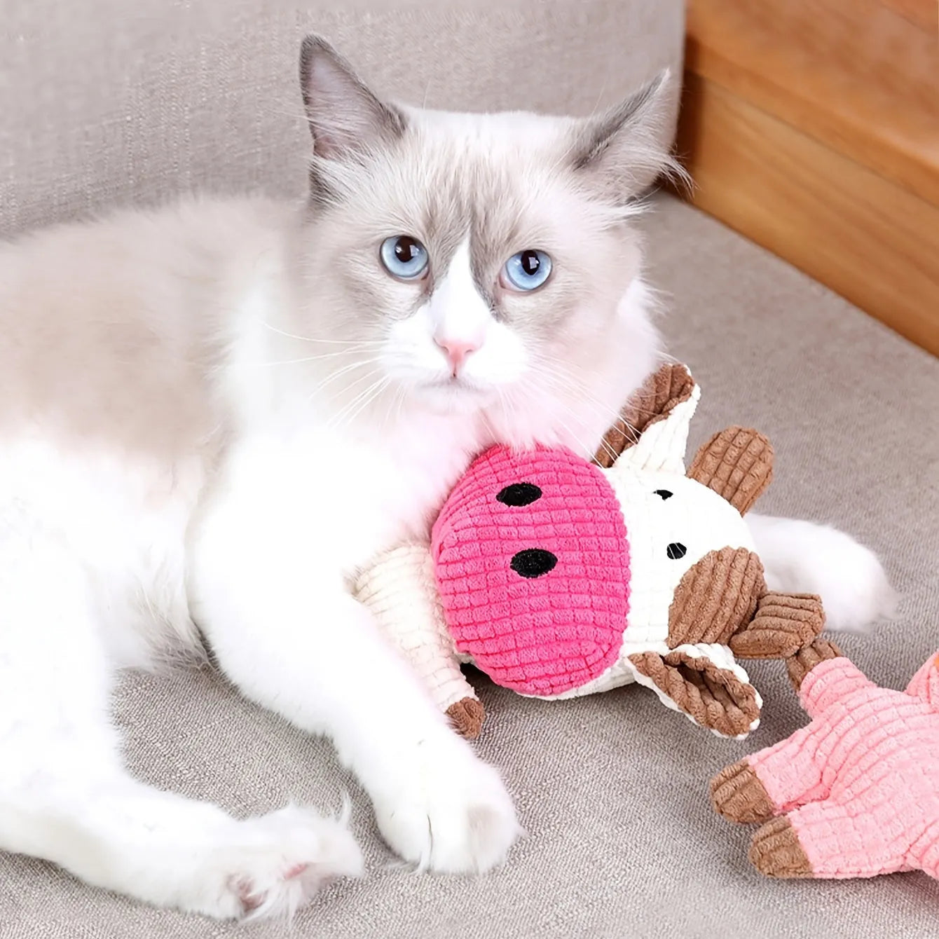 Animal shaped plush dog chew toy with squeaker in blue, brown, cow, gray, pink, white or yellow