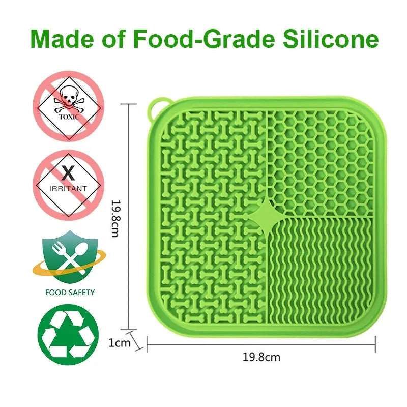 Square orange silicone dog licking mat with suction cups on back and textured surface