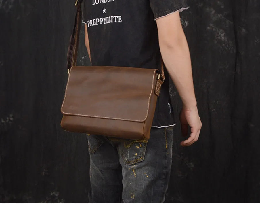 Men's vintage brown leather messenger bag with flap cover and adjustable shoulder strap