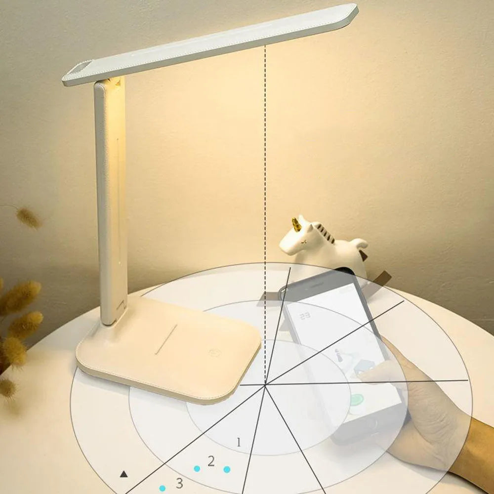 White plastic LED table lamp with touch dimming control and USB charging for children's bedroom use