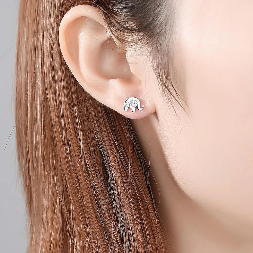 Geometric Korean ladies earrings in silver with gem setting, measuring 0.6cm by 0.9cm