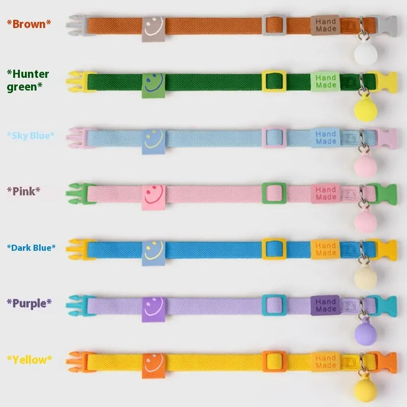 Small dog elastic pet collar in polyester material showing adjustable length of 22-32cm in seven colour options