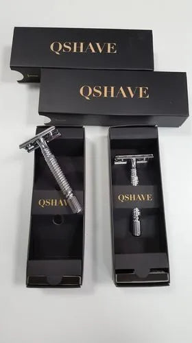 Superior double-edged safety razor, blade, and storage box shaving kit.