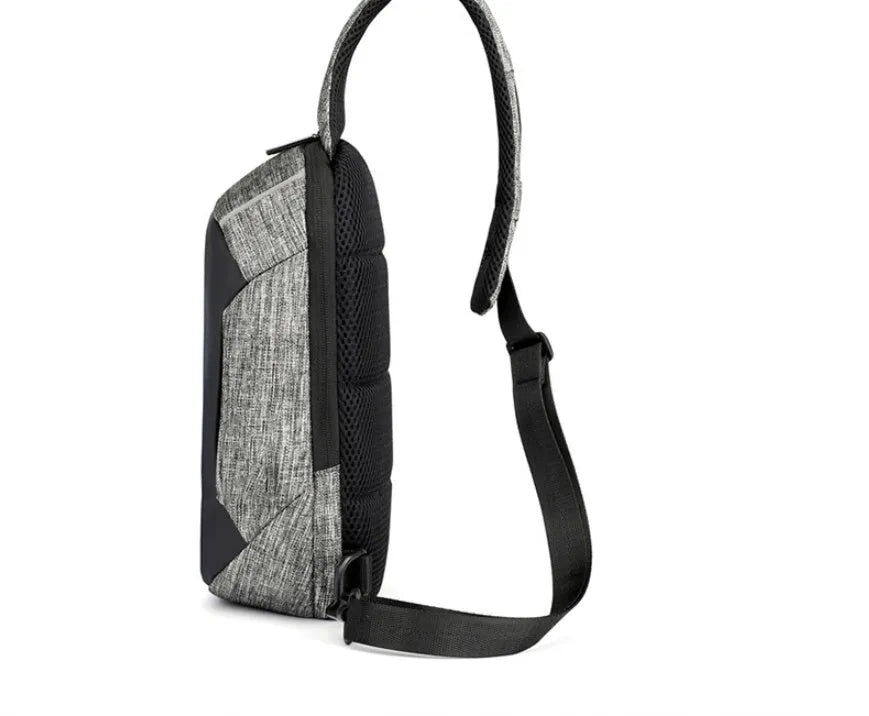 Small dark blue Oxford cloth chest bag with a zipper, shown with dimensions 18cm wide by 31cm high.